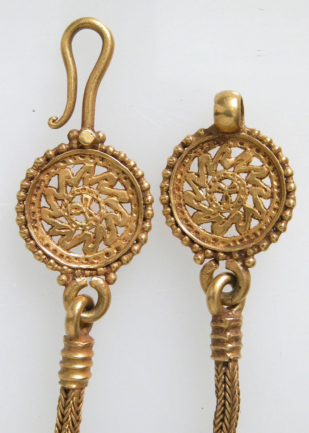 Gold baptismal cross on chain